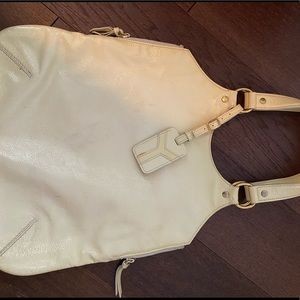 YSL yellow patent leather bag